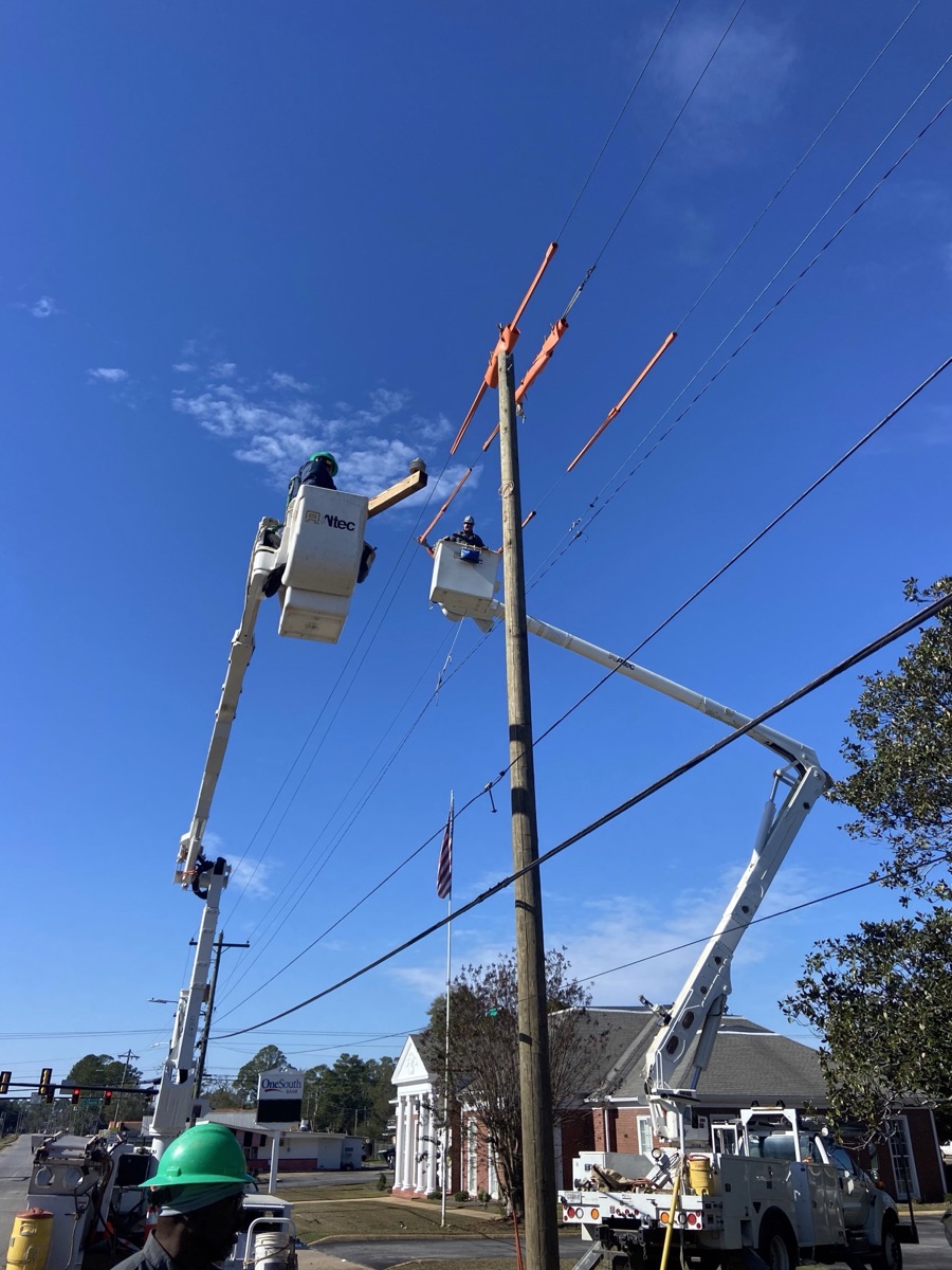 City of Blakely electric crew at work replacing a broken power pole on Columbia Highway