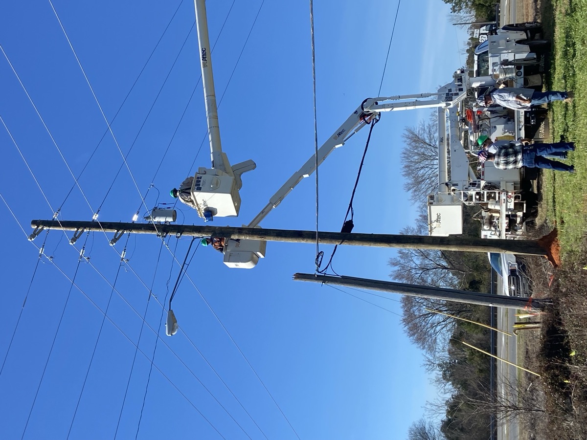 The new taller pole with lines arranged vertically